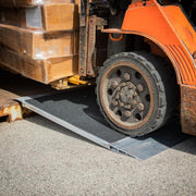 HD Ramps 48" x 45" Grit-Coat Shipping Container Ramps 8,000 lb. Capacity is in use by a forklift