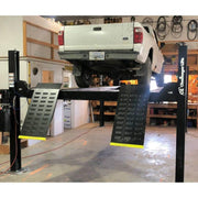 Challenger Lifts 4P14XFX Extended Four Post Auto Lift 14,000 lb Capacity is in use