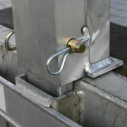 adjustable offset stake pocket post of the HD Ramps 5" x 100.875" x 20" Aluminum Load Leveler Bridge for Step Deck Trailers 
