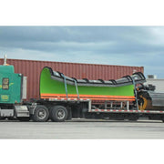 view from afar of the HD Ramps 5" x 100.875" x 22" Aluminum Load Leveler Bridge for Step Deck Trailers while in use