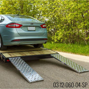 HD Ramps 5' x 12" Hook End Aluminum Car Trailer Ramps 3,000 lbs Capacity is attached to the trailer