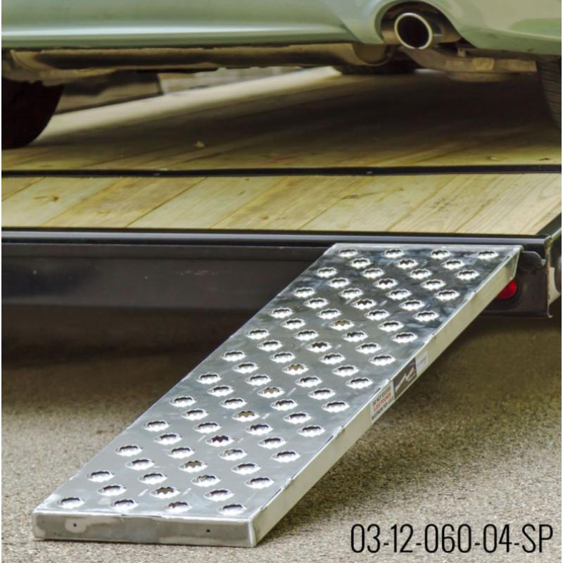 HD Ramps 5' x 12" Hook End Aluminum Car Trailer Ramps 3,000 lbs Capacity is hooked to the trailer
