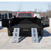 HD Ramps 6' x 15" Hook-End Equipment Ramps attached to the pickup truck