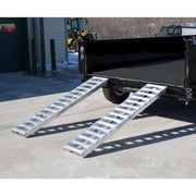 HD Ramps 6' x 15" Hook-End Equipment Ramps attached to the truck
