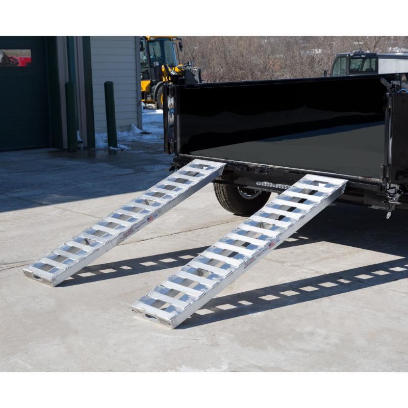 HD Ramps 6' x 15" Hook-End Equipment Ramps attached to the truck
