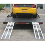 HD Ramps Aluminum Plate-End Trailer Ramps 4' x 15" is attached to the trailer