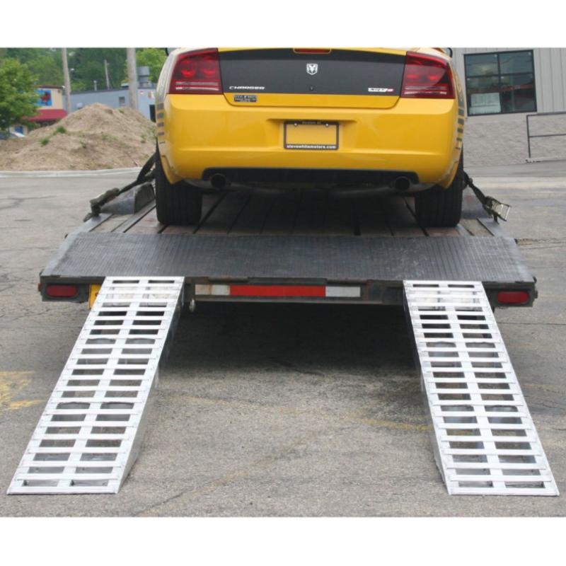 HD Ramps Aluminum Plate End Car Trailer Ramps mounted on a trailer

