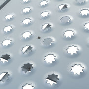 Black Widow Aluminum Punch Plate Folding ATV Ramp close up picture of the punch plate
