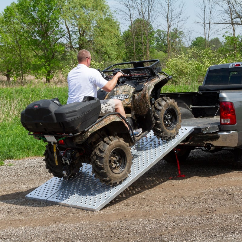 Black Widow Aluminum Punch Plate Folding ATV Ramp in use
