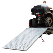 Black Widow Aluminum Punch Plate Folding ATV Ramp mounted on a pickup truck with ATV on it
