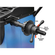 Atlas WB41 wheel balancer, hood open with wheel mounted