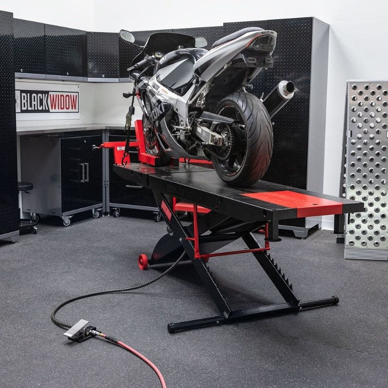Black Widow ProLift Heavy-Duty Pneumatic Motorcycle Lift Table with motorcycle on it