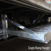HD Ramps Bolt-On Semi-Trailer Loading Ramp Storage Brackets for One Ramp close up picture of the ramp hanger attached to the trailer