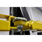 footpad close up of the Challenger Lifts CL10AV3 Versymmetric Two Post Auto Lift 10,000 lb Capacity is in use