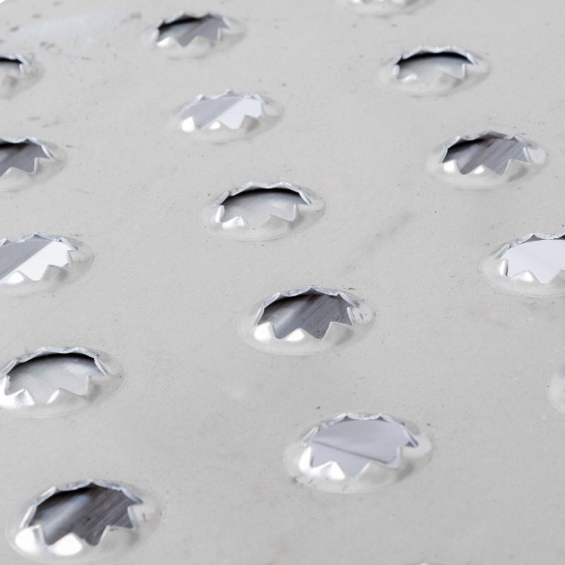 punch plate of the HD Ramps EZ Traction Aluminum Hook End Car Trailer Ramps 5'x15" 5,000 lbs Capacity 