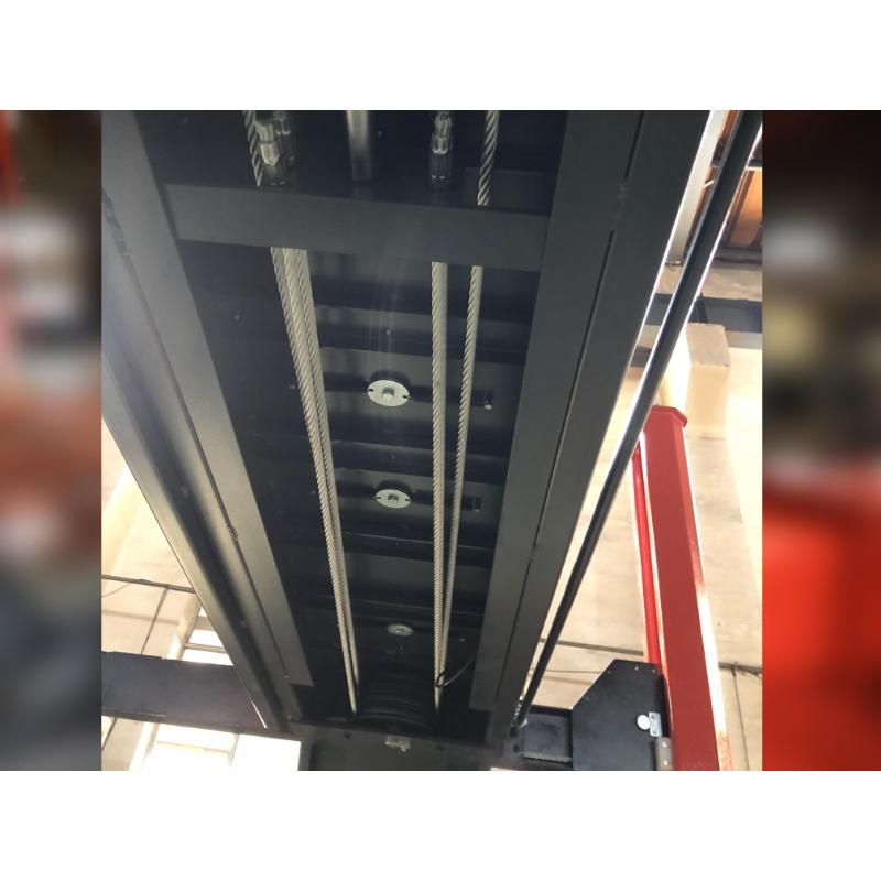 view from below of the KATOOL KT-4H150 4-Post Alignment Lift 15,000 lb Capacity, Rolling Jack Included
