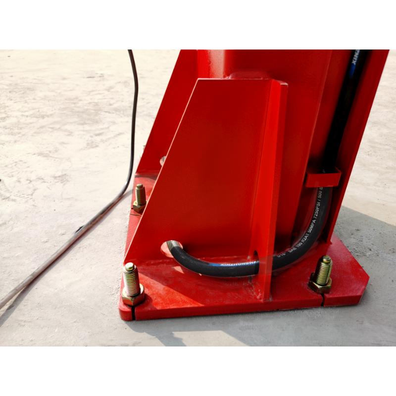 foot of the KATOOL KT-M120 2-Post Clear-Floor Vehicle Lift 12,000 lb Capacity, Overhead Beam, Manual Lock Release
