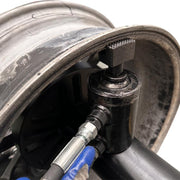 rim being straighten using the KATOOL KT-WL69 Rim Straightener Hydraulic 10"-26" Rim Capacity
