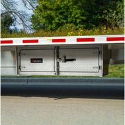 HD Ramps Lockable Diamond Plate Underbody Trailer Toolbox mounted on a trailer
