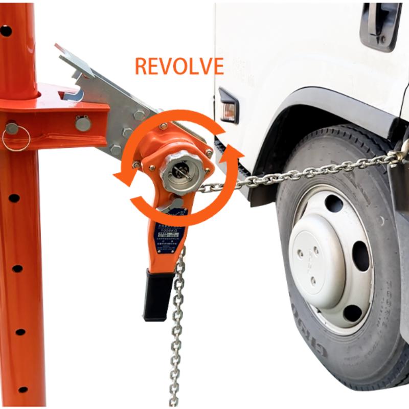 Orange Katool Auto Body Puller attached to a vehicle tire