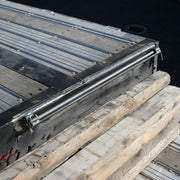 HD Ramps Steel Skid Seat Attaching Bracket attached to the trailer