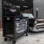 Sunex 8065PCBK57 57 Chevy power cart beside a classic 57 Chevy