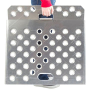 Guardian 36 inch aluminum curb ramp shown with integrated carry handles for easy transport and positioning.
