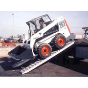 HD Ramps heavy equipment pin-on ramps are used to safely unload a Bobcat skid steer.
