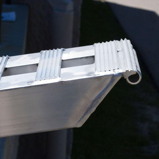 HD Ramps close-up view of the heavy-duty aluminum pin-on end with the visible pin insertion hole.