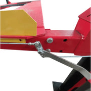 Four post storage lift from Katool showing the edge stopper on the platform that prevents vehicles from rolling off.