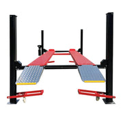 Four post storage lift from Katool shown from the ramp angle highlighting diamond-plate runways and platform access.