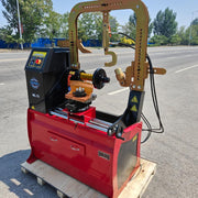 Rim straightener from Katool shown from a side angle highlighting heavy-duty steel construction for professional wheel repair.