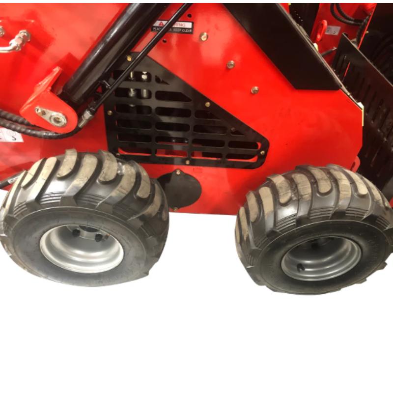 Mini skid steer loader from KATOOL showing the wheel system that supports stable movement and controlled jobsite handling.
