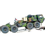 HD Ramps 20,000 lb. modular step deck ramp system safely loads a heavy-duty military vehicle.