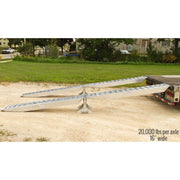 HD Ramps modular aluminum loading ramp is shown securely attached to the skid seat bracket on the trailer.