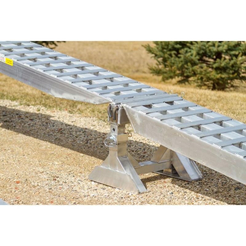 HD Ramps 23,500 lb. loading ramp system is shown pinned to the adjustable ramp support stand for safe use.